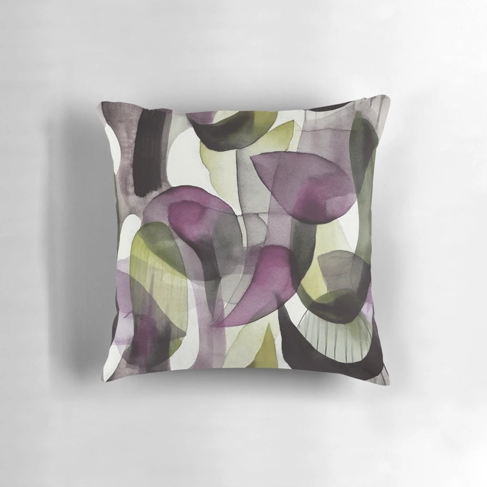 Colorful abstract watercolor pattern on a modern throw pillow for home decor