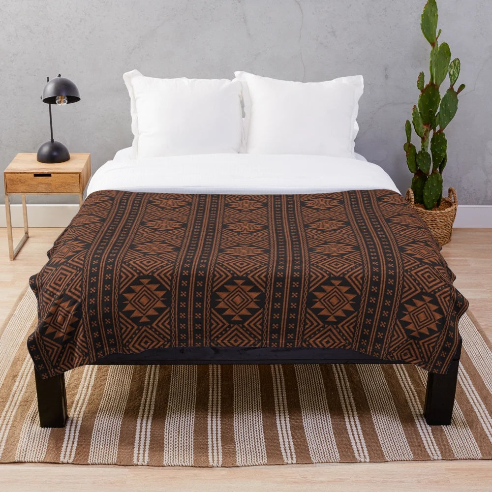 Ekai orange and black African tribal pattern plush blanket with bohemian geometric mudcloth design