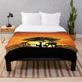 Wild animals on an African savanna sunset landscape plush blanket