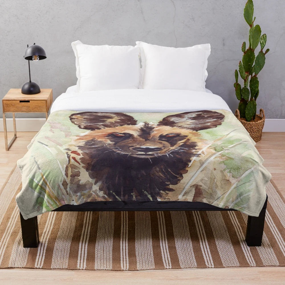 Colorful watercolor painting of an african wild dog on a plush blanket