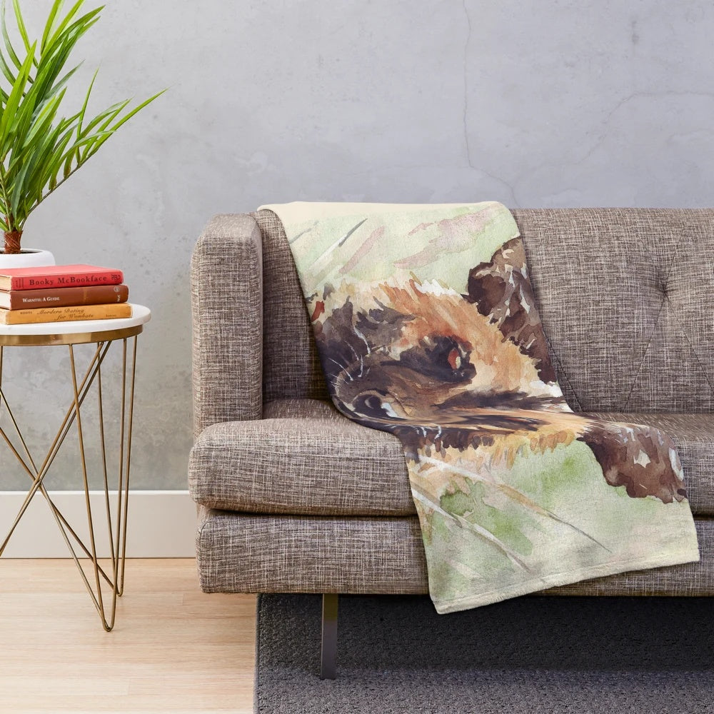 Colorful watercolor painting of an african wild dog on a plush blanket