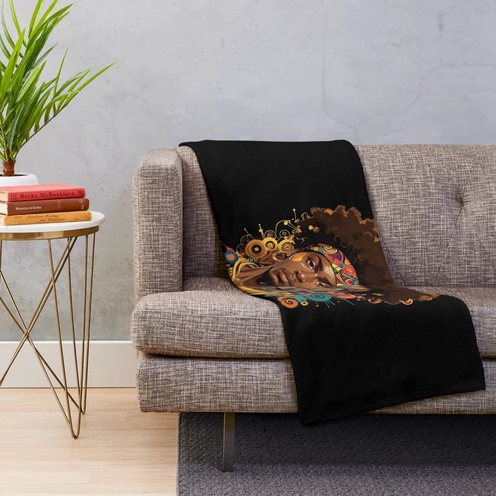 Afro-inspired plush blanket with vibrant patterns and natural hair design