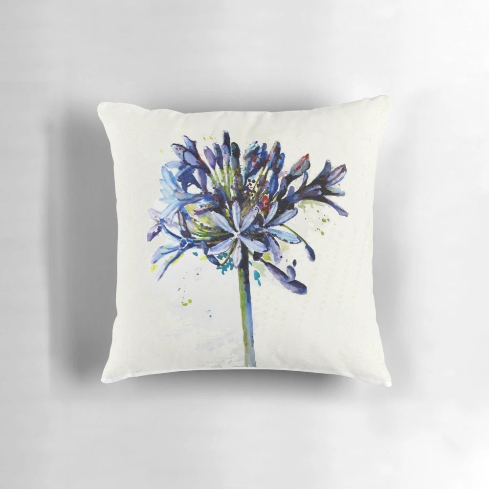 Decorative pillow featuring a beautiful, blue agapanthus flower in bloom