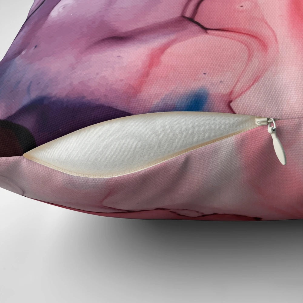 A vibrant abstract alcohol ink painting pillow featuring a bold, expressive flame-inspired design in shades of pink, purple, and blue.