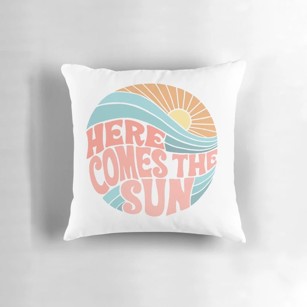 Colorful and vibrant sun-themed pillow with a groovy, psychedelic design