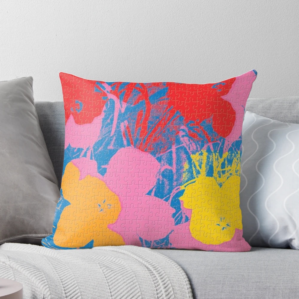 Colorful modern throw pillow featuring an Andy Warhol-inspired pop art design