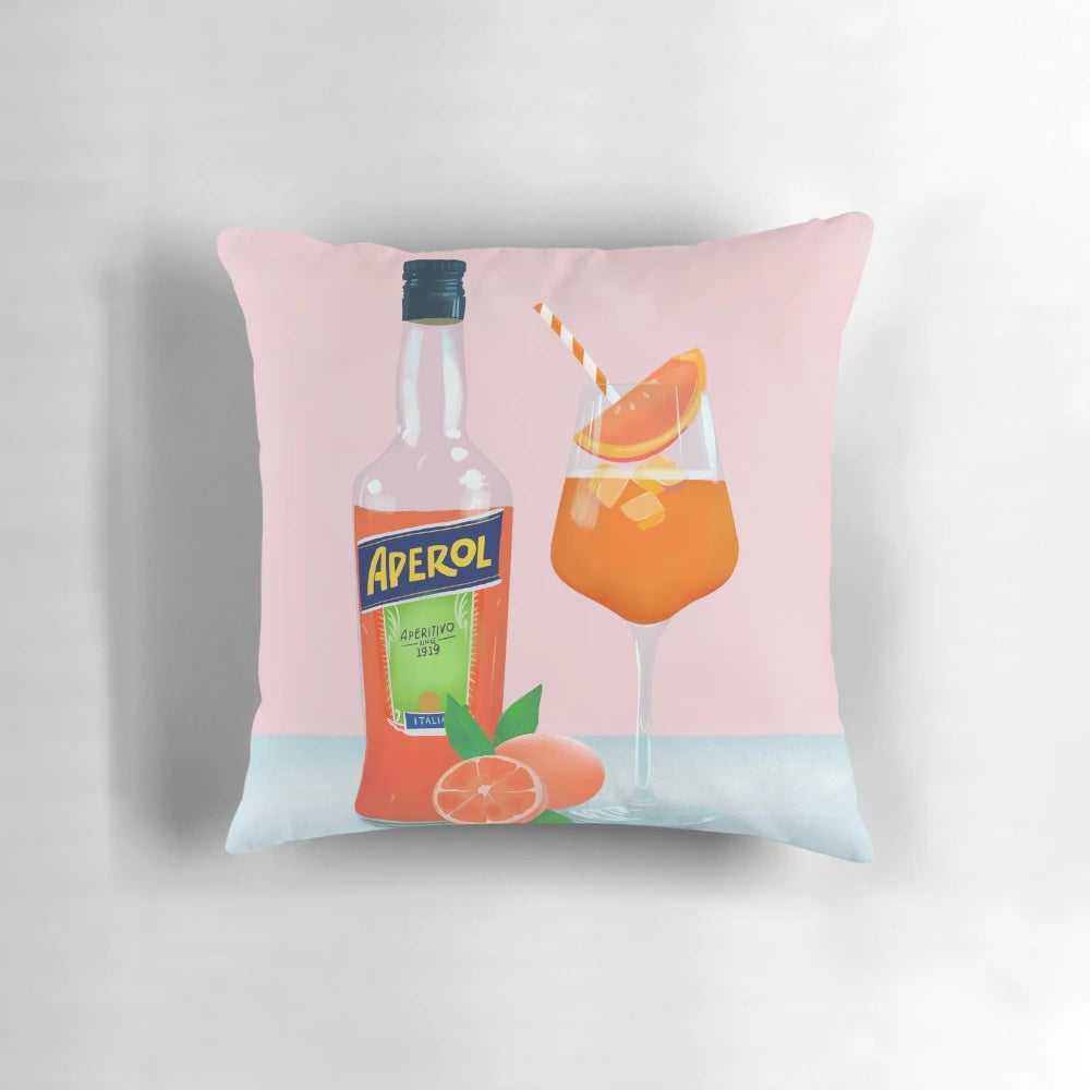 Colorful throw pillow with a playful Aperol Spritz cocktail design