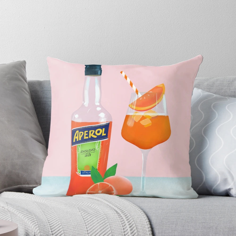 Colorful throw pillow with a playful Aperol Spritz cocktail design