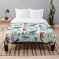 Colorful plush blanket featuring watercolor illustrations of aquatic crayfish species