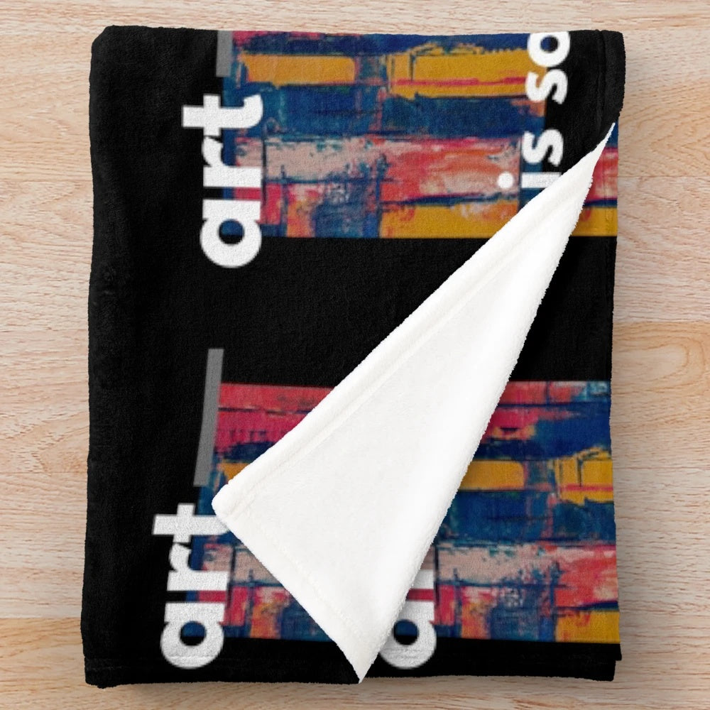 Colorful and vibrant plush blanket with artistic patterns and designs