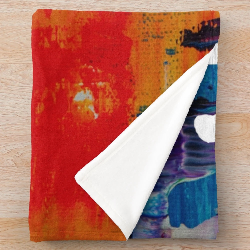 Colorful plush blanket with artist-inspired paint splatters and strokes