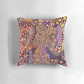 Colorful abstract Australian aboriginal art design on a decorative throw pillow