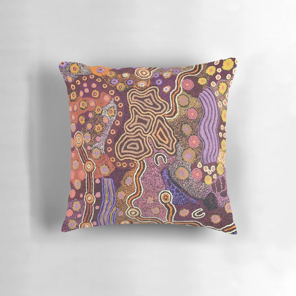 Colorful abstract Australian aboriginal art design on a decorative throw pillow