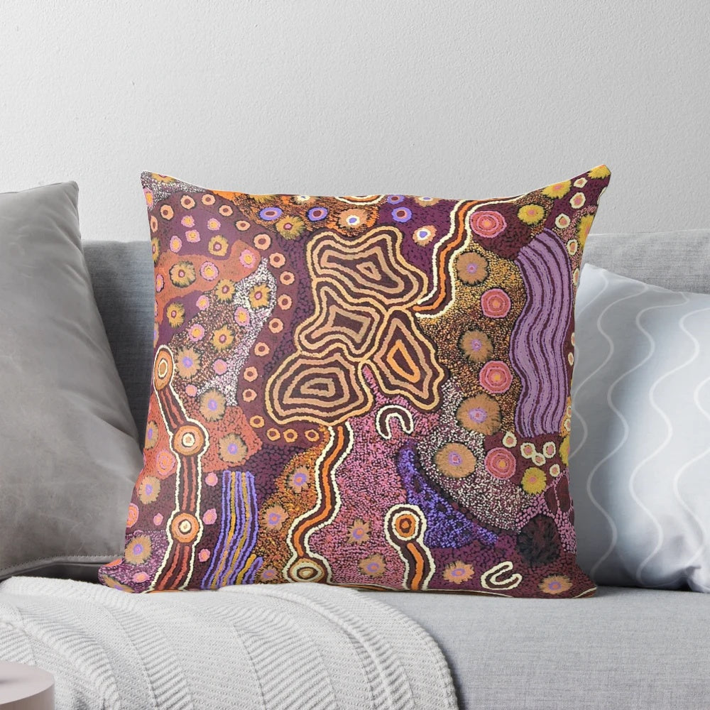 Colorful abstract Australian aboriginal art design on a decorative throw pillow
