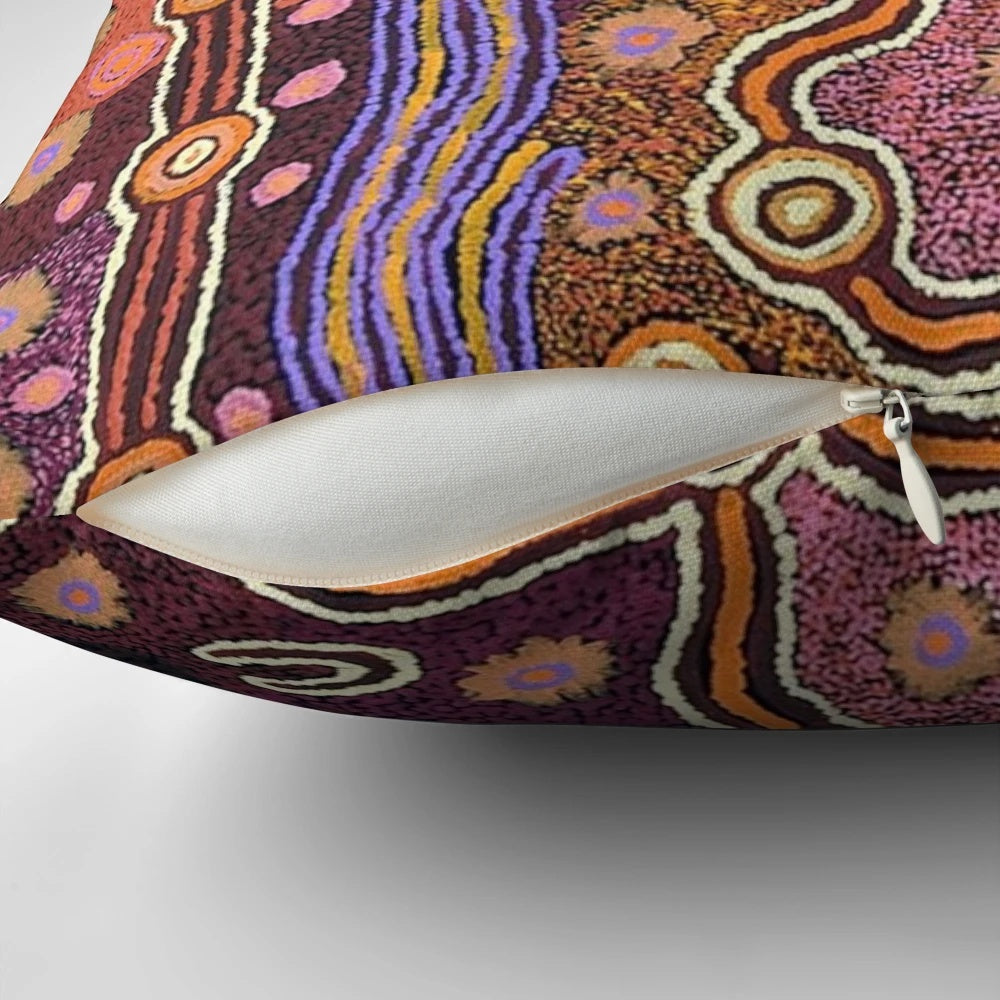 Colorful abstract Australian aboriginal art design on a decorative throw pillow