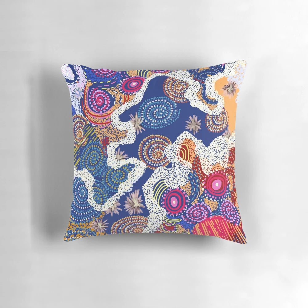 Colorful Australian aboriginal art pillow featuring traditional designs and a quokka, a beloved native Australian marsupial.