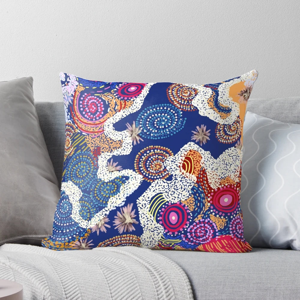 Colorful Australian aboriginal art pillow featuring traditional designs and a quokka, a beloved native Australian marsupial.