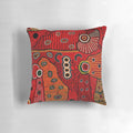 Colorful abstract Australian aboriginal-style art design on a soft throw pillow