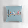 Colorful pillow featuring a variety of Australian birds, including a cockatoo, parrot, rainbow lorikeet, and fairy wren.