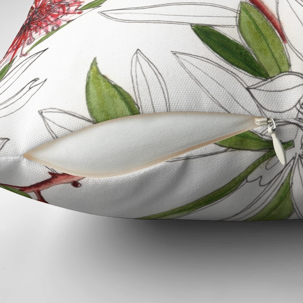 Closeup of a red bottlebrush flower in a watercolor style on a throw pillow
