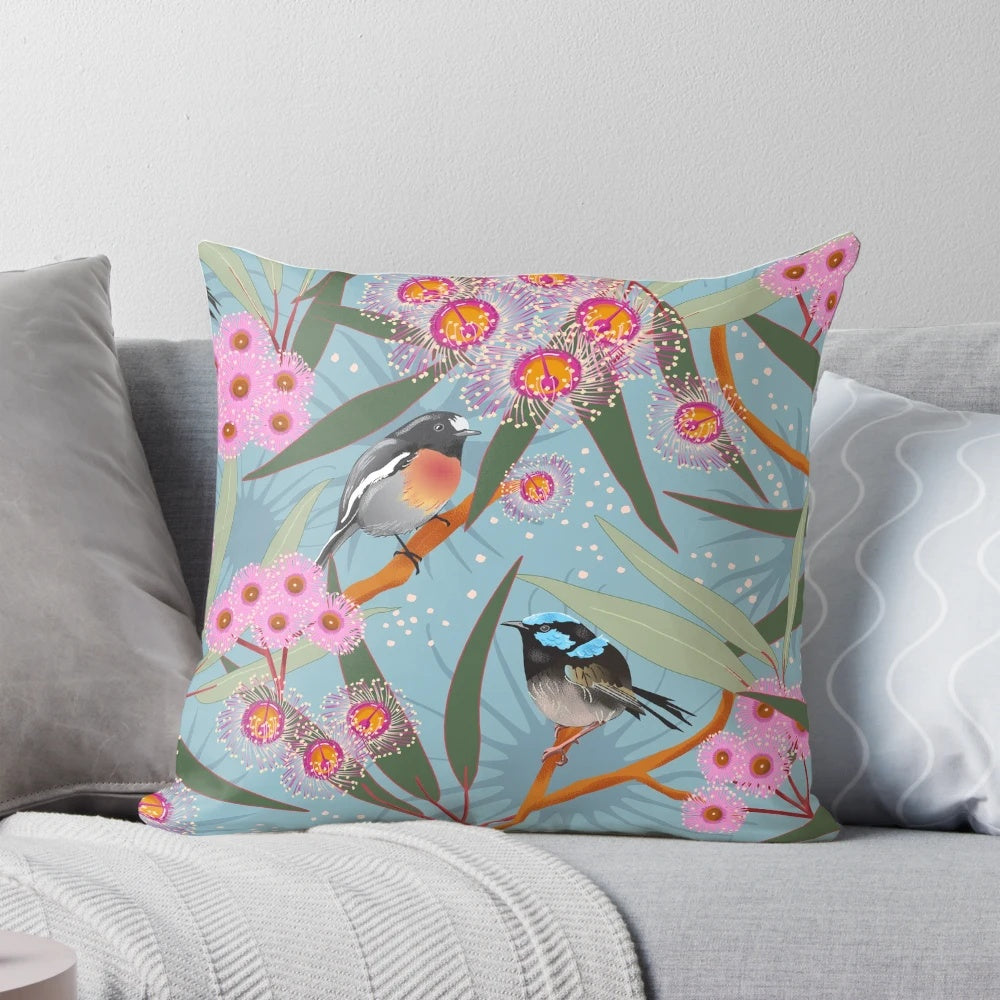 Pillow with a beautiful design featuring Australian eucalyptus flowers, a fairy wren, and a scarlet robin.