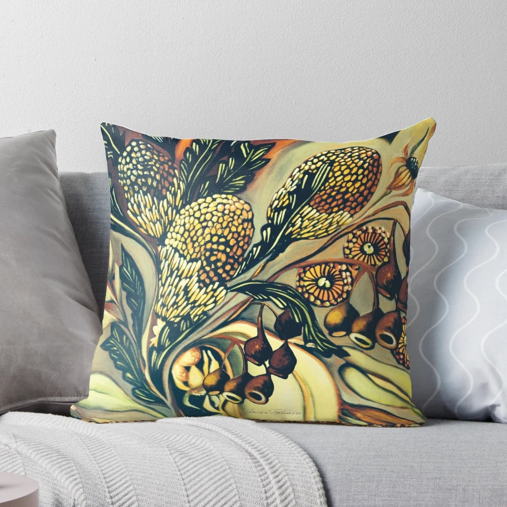 Pillow featuring a colorful design of native Australian plants and flowers