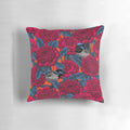Decorative pillow featuring a vibrant illustration of a red waratah flower and fairy wrens in a botanical, nature-inspired design.