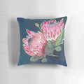 Pink and blue floral patterned decorative pillow featuring native Australian flowers