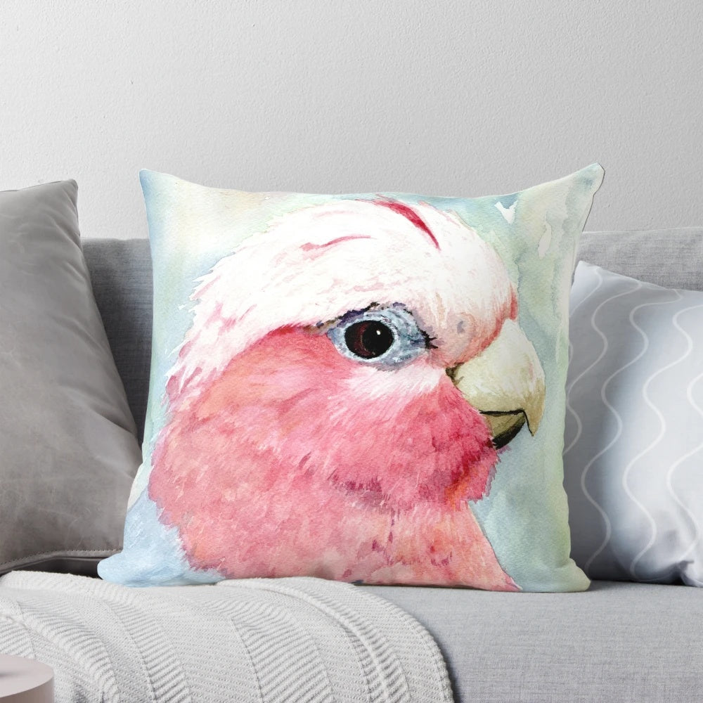 Colorful watercolor painting of an Australian galah cockatoo bird on a decorative pillow