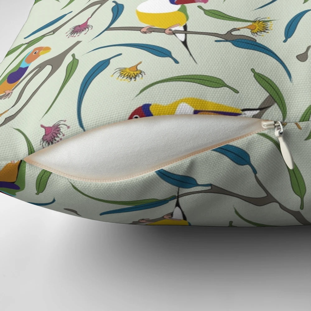 Colorful throw pillow featuring a vibrant Australian Gouldian finch, also known as the Rainbow finch.