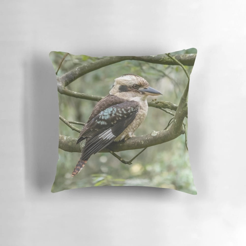 Colorful photograph of a laughing kookaburra, an iconic Australian bird species, featured on a decorative throw pillow.