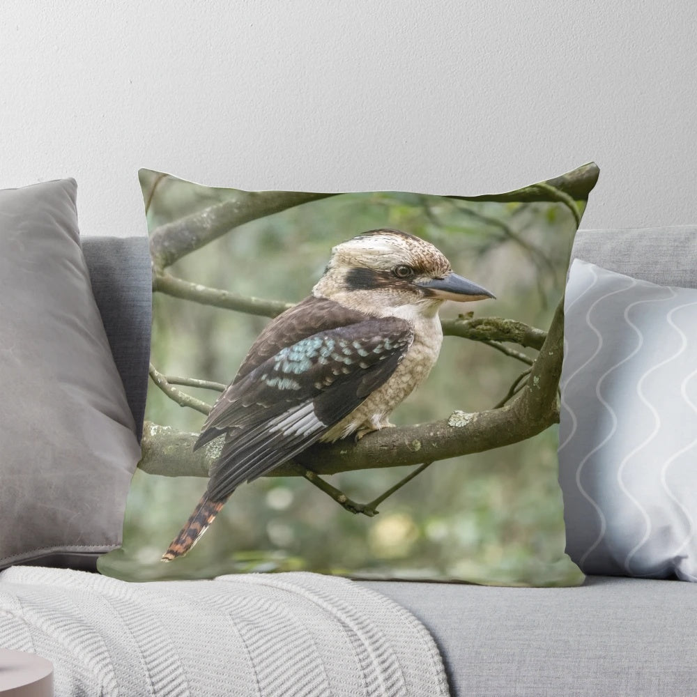 Colorful photograph of a laughing kookaburra, an iconic Australian bird species, featured on a decorative throw pillow.
