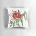 Colorful watercolor painting of Australian native bush flowers and leaves on a decorative pillow