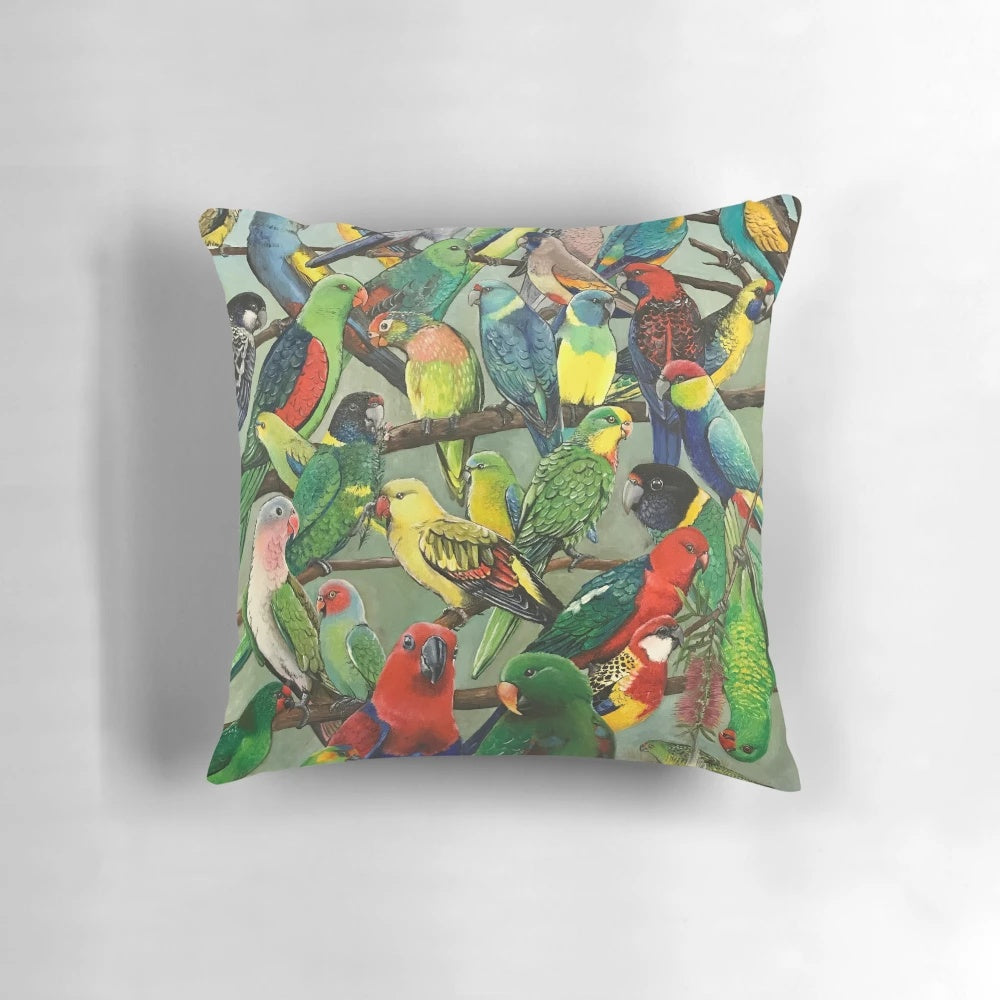 Colorful Australian parakeets printed on a decorative pillow