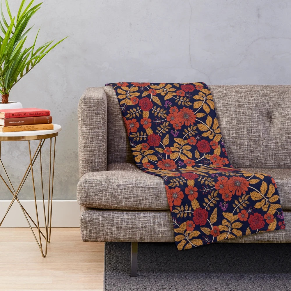 Autumn floral plush blanket with a colorful, botanical design