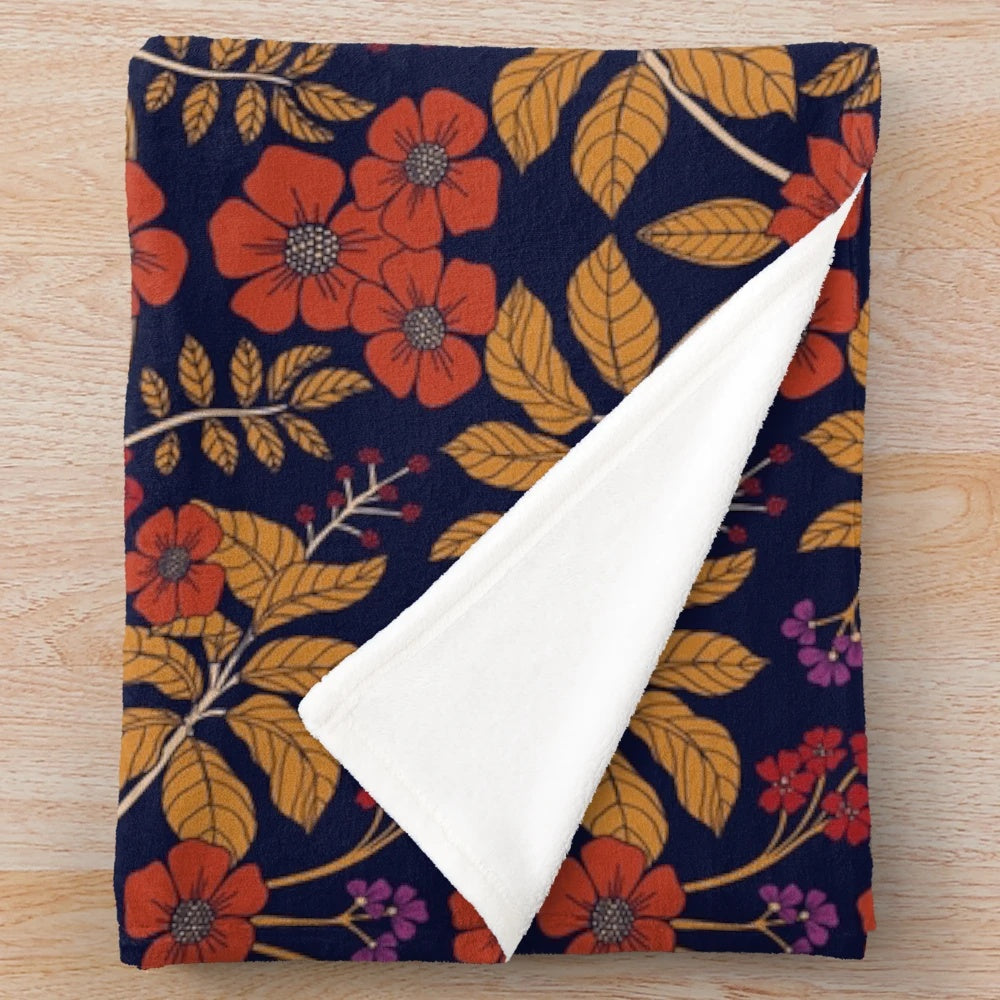 Autumn floral plush blanket with a colorful, botanical design