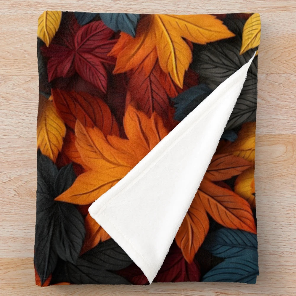 Cozy plush blanket featuring a vibrant autumn leaf design
