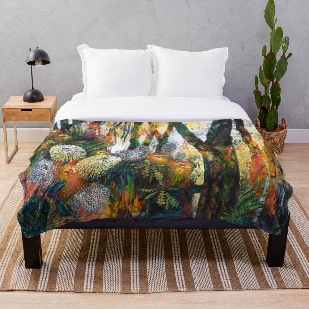 A cozy plush blanket featuring a vibrant abstract floral design inspired by Australian native flowers and plants.