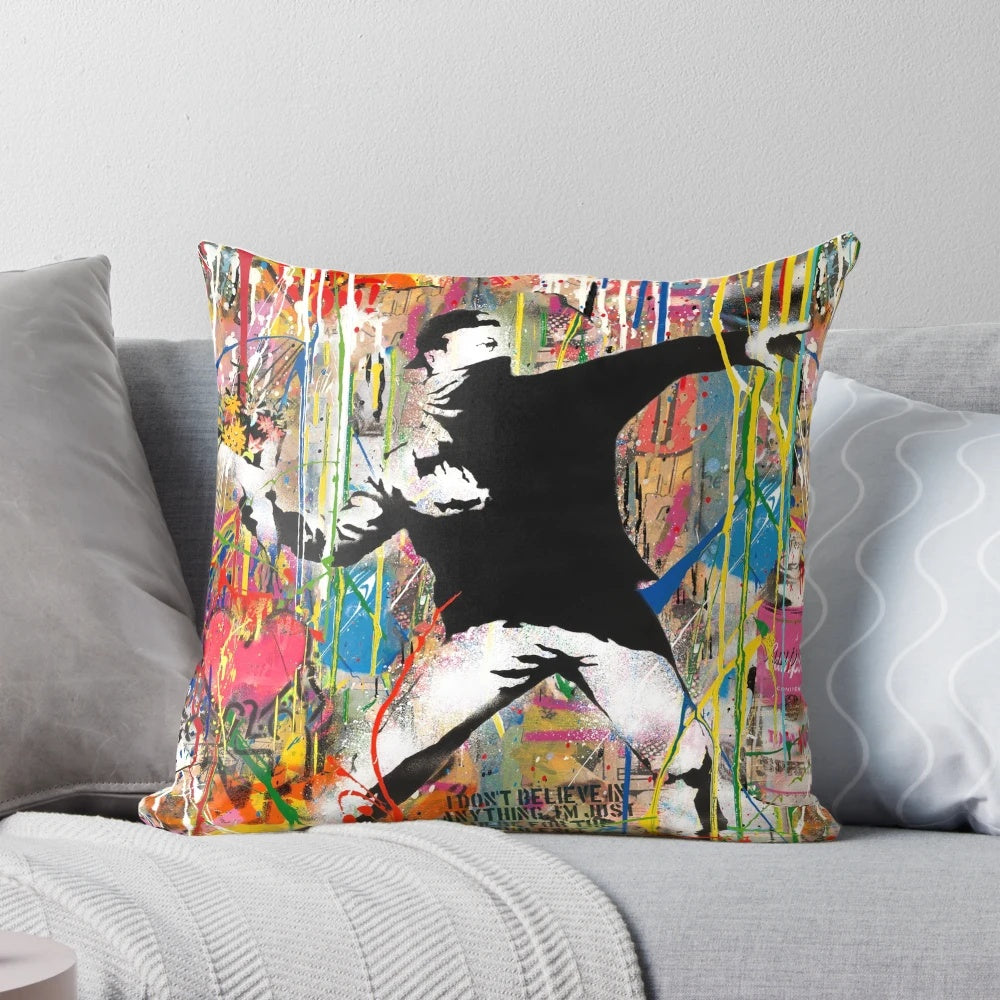 Colorful and iconic Flower Thrower pop art design on a soft, comfortable pillow for urban contemporary home decor.