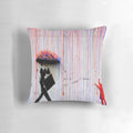 Colorful Banksy-inspired pillow design featuring a woman walking in the rain under a vibrant rainbow