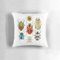 Colorful beetle-inspired pillow with a nature and science-themed design