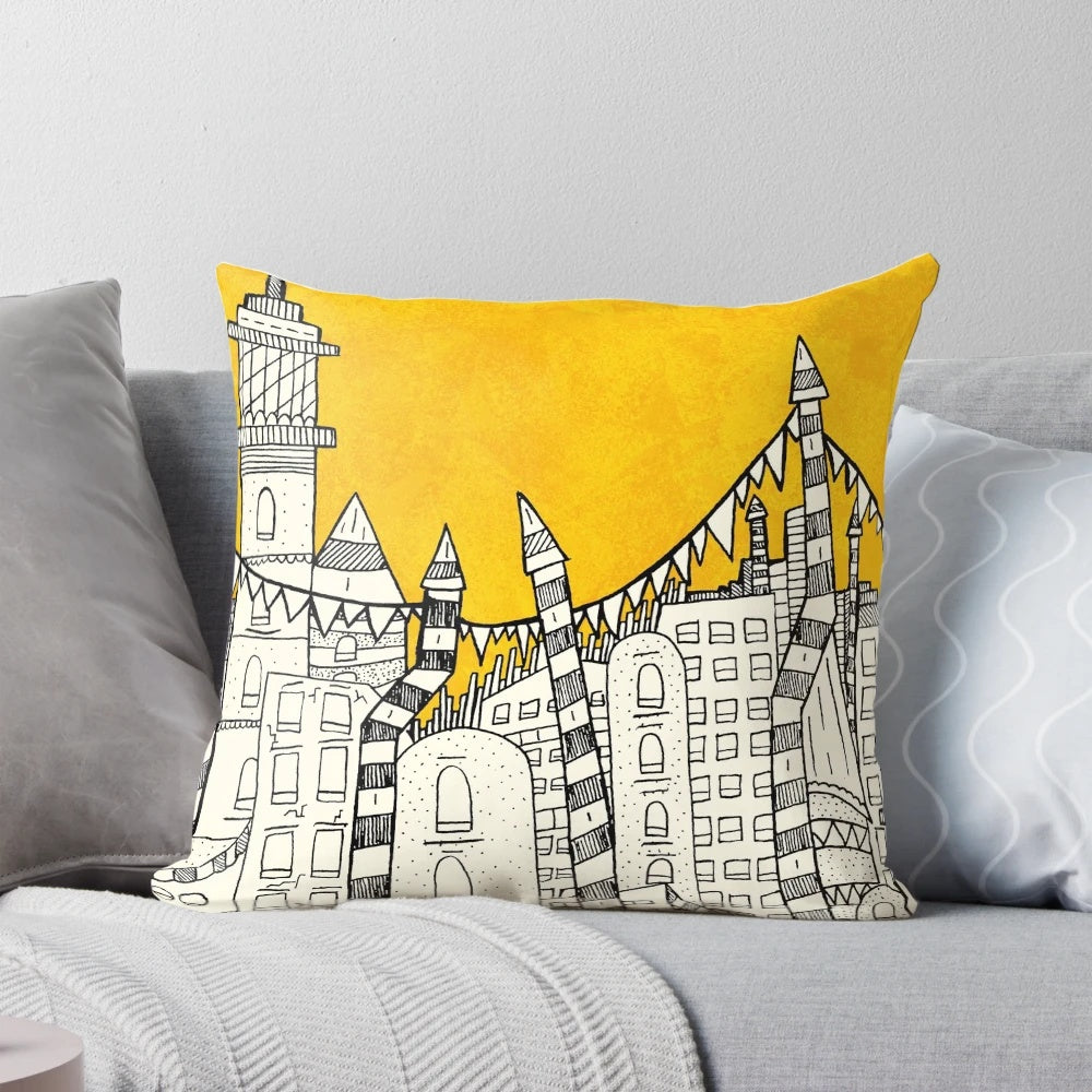 Colorful abstract throw pillow with a design featuring a big yellow sun over a small city skyline.
