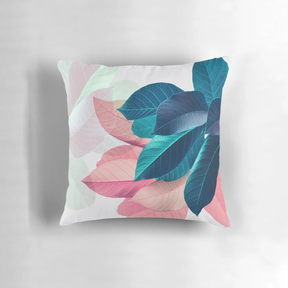 Colorful blue and pink printed leaf design throw pillow