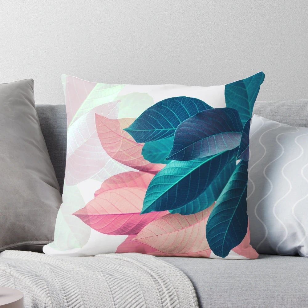 Colorful blue and pink printed leaf design throw pillow
