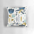 Colorful blue and yellow watercolor floral design on a decorative throw pillow