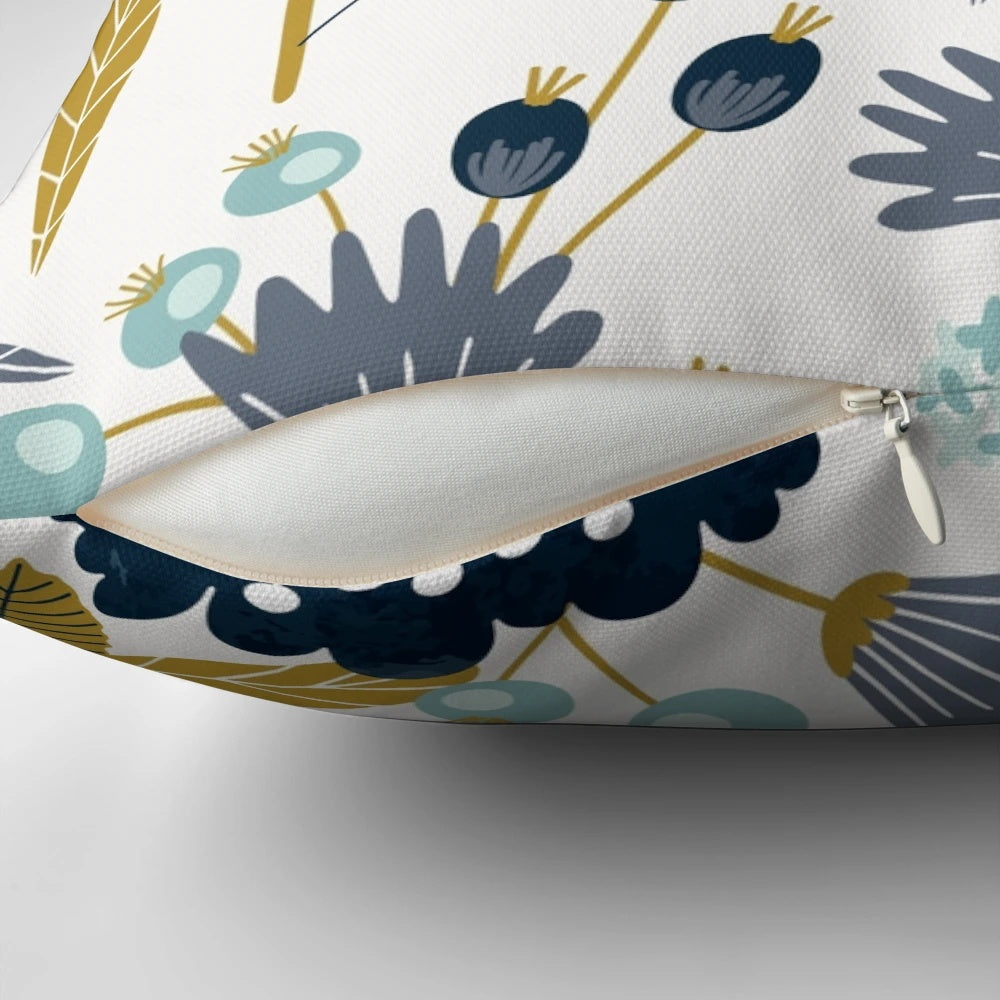 Colorful blue and yellow watercolor floral design on a decorative throw pillow