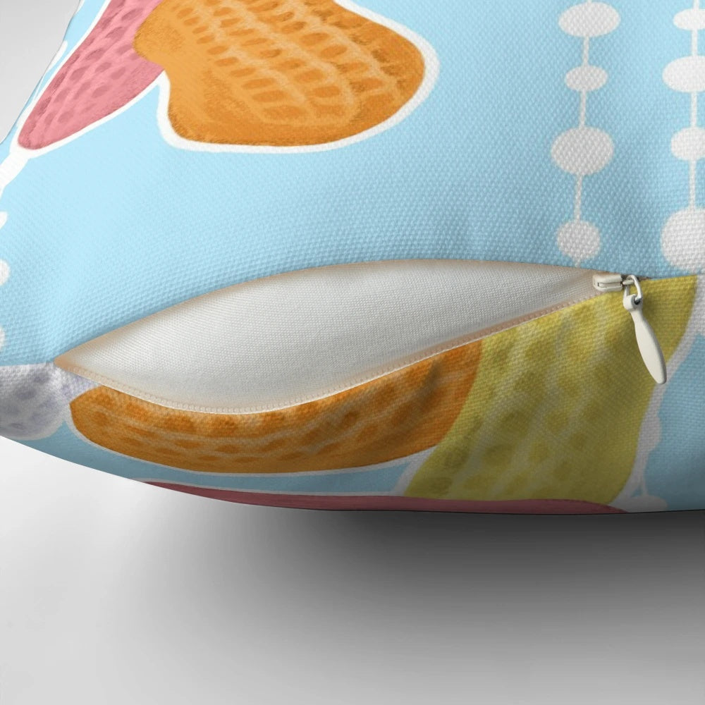 Blue circus peanut-themed pillow with a fun, dotted pattern