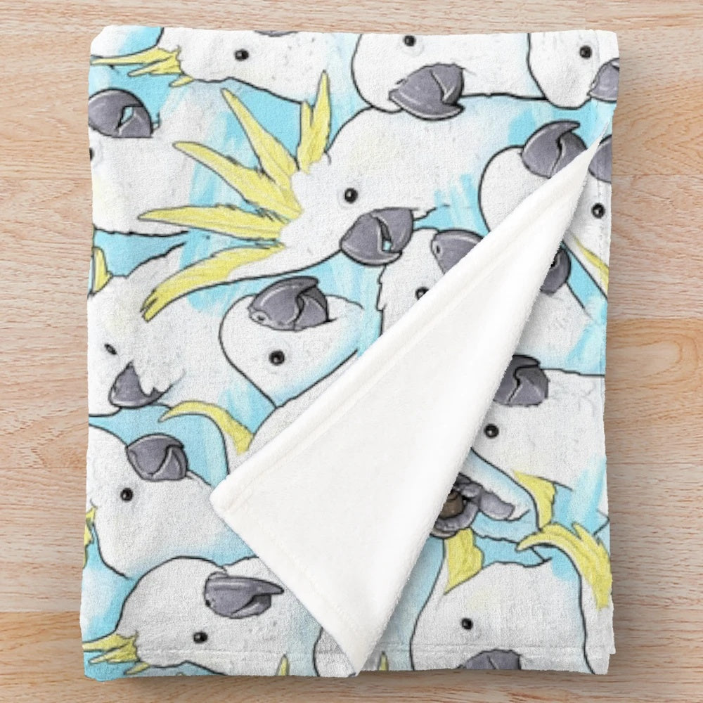 Soft and plush blue cockatoo-themed blanket