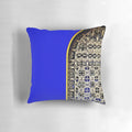 Closeup of a luxurious blue Majorelle pillow with a tropical, lush design