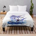 Plush blanket featuring a vibrant blue marlin and tuna design by marine artist Carey Chen